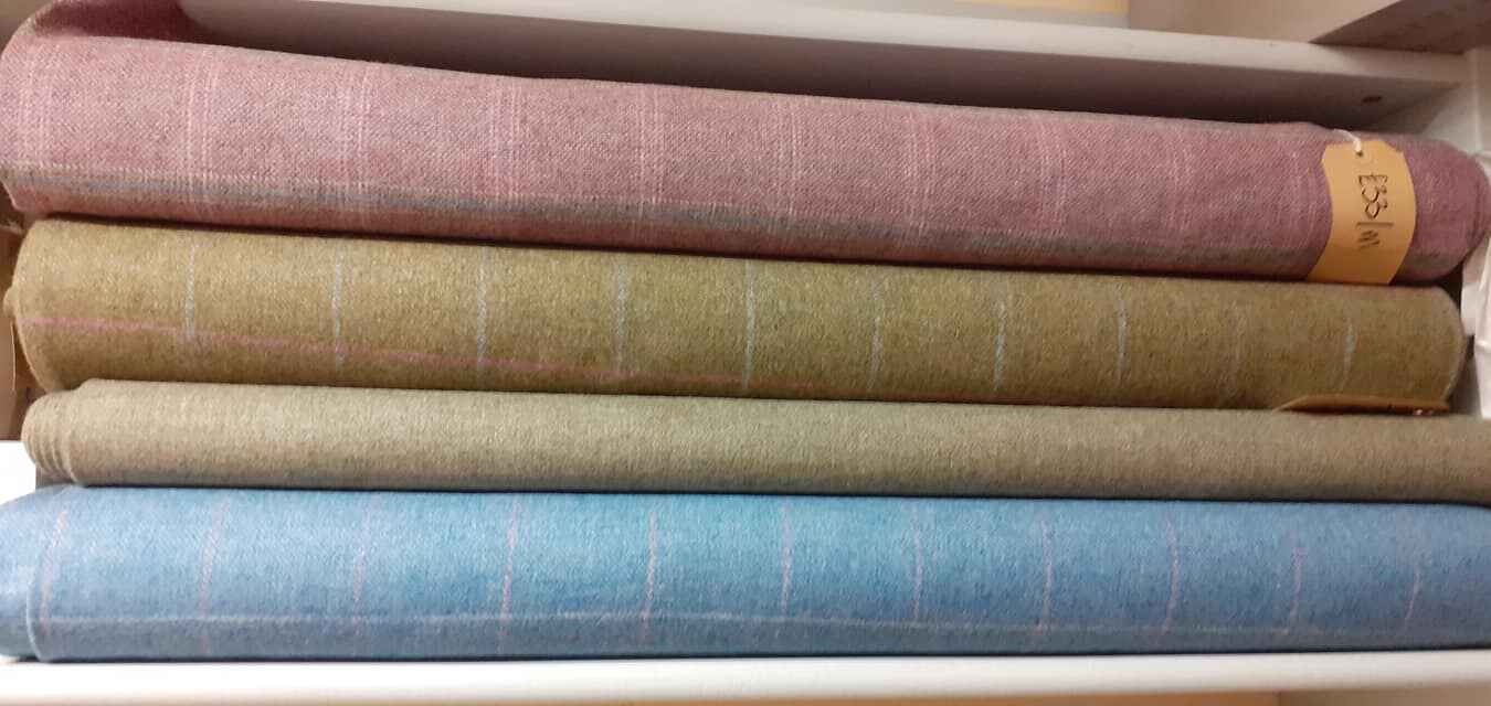 Marton Mills pink, green, grey, and blue tweed fabrics. Photo