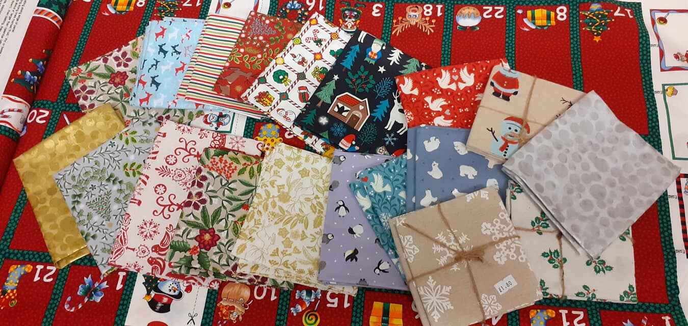 Small cut-offs of Christmas themed fabric. Photo