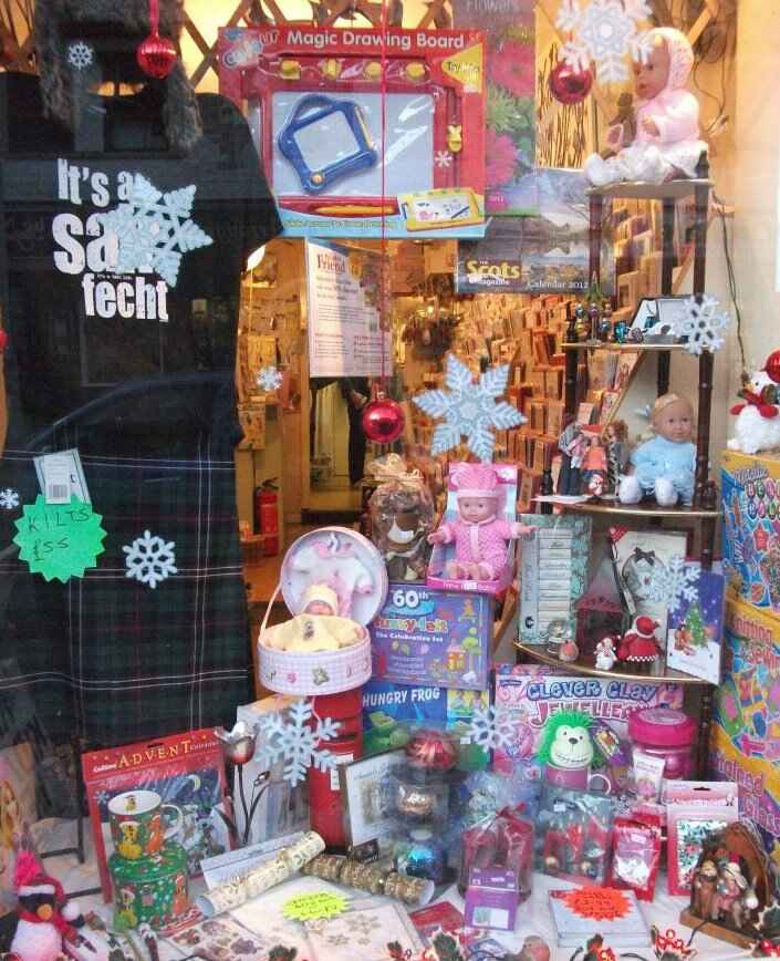 An assortment of winter gifts and toys as part of a window display. Photo