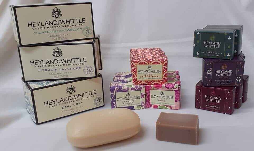 An assortment of Heyland and Whittel soaps, some large regular bars and some smaller square fragranced blocks. Photo